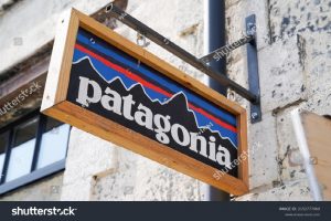 Patagonia logo brand and text sign on facade shop fashion clothes entrance store