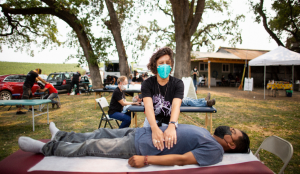 California farmworker gets treated by The Botanical Bus herbalist