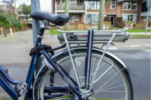 Dutch electric bicycle with house in the background