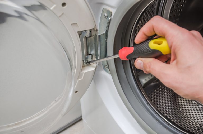 Master Repairs The Broken Washing Machine The Optimist Daily Making Solutions The News