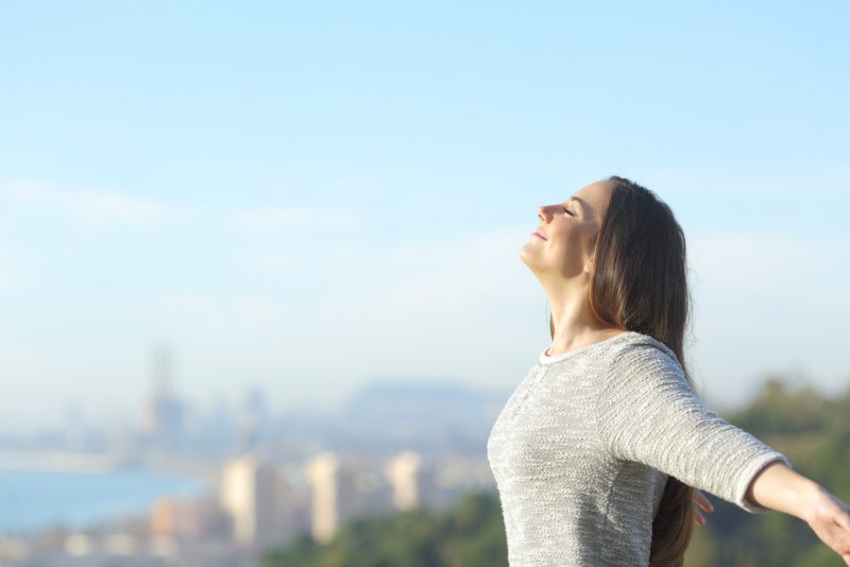 Profile,Of,A,Woman,Breathing,Deeply,Fresh,Air,With,A | The Optimist ...