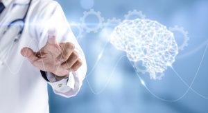 Scientist in white lab coat pointing at brain signals.