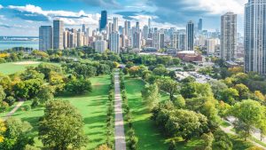 Chicago skyline aerial drone view from above, lake Michigan and city of Chicago downtown skyscrapers cityscape bird's view from park, Illinois, USA.