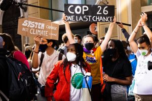 Youth activists march at COP26 climate conference in Glasgow