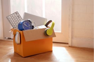 box of unwanted and unused electronics ready for donation