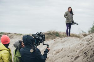 Filming a movie on sand dunes